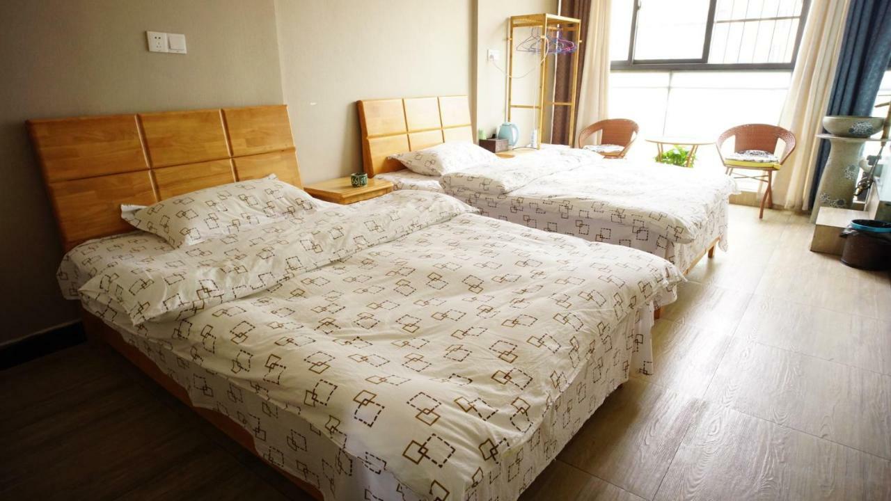 Huanlesong Youth Hostel Wuhan Værelse billede